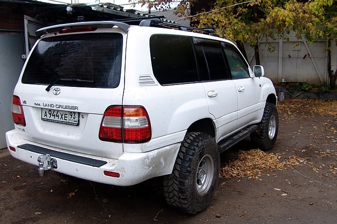 Крузер 100 лифт. Toyota Land Cruiser 105. Ленд Крузер 105 белый. Тойота ленд Крузер 100. Ленд Крузер TLC 100.