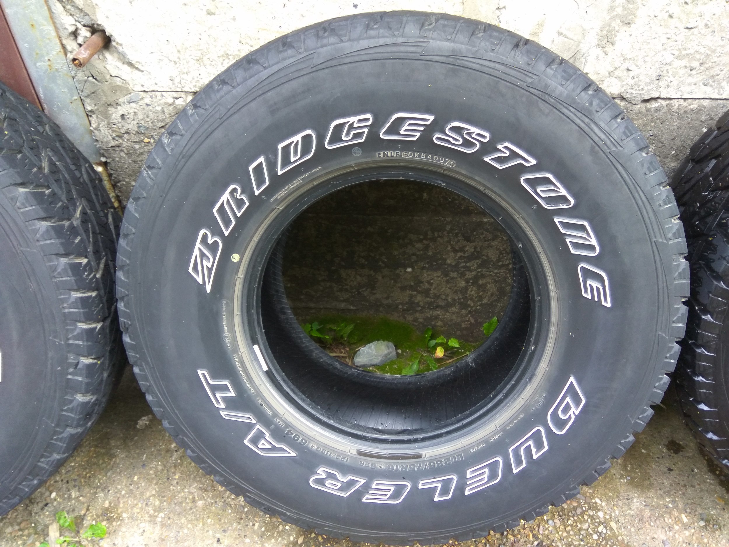 A t 245 75 r16. Bridgestone Dueler a/t 693iv. Покрышки Bridgestone Dueler. Bridgestone 265/65r18 114v Dueler a/t 693iv TL RBT. Bridgestone Dueler m/t 674 lt215/75 r15.